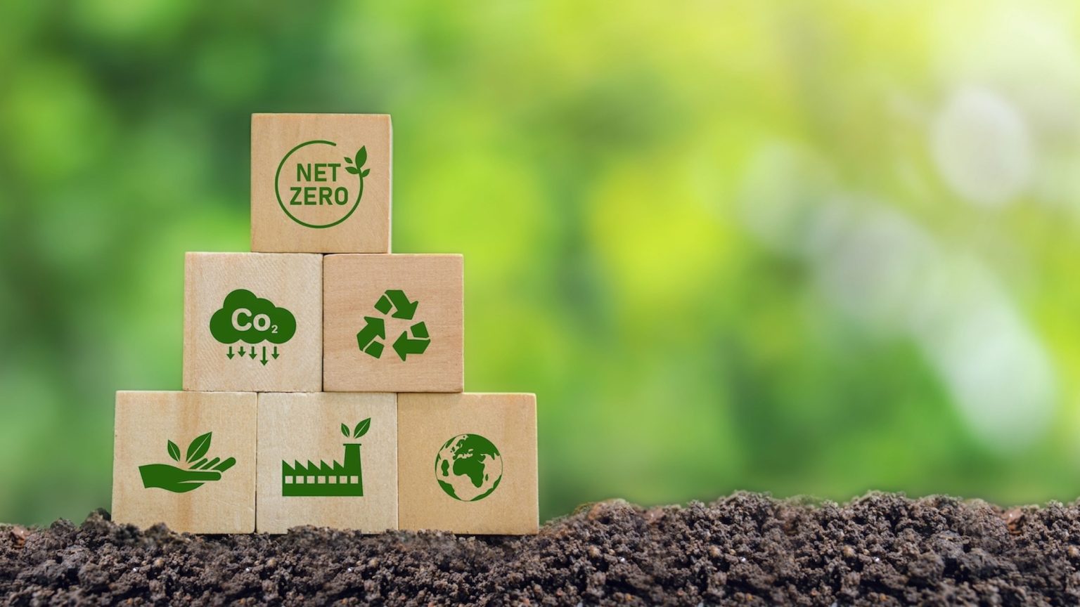 Carbon neutral and net zero concept natural environment Climate-neutral long-term strategy greenhouse gas emissions targets Wooden block with green net center icon