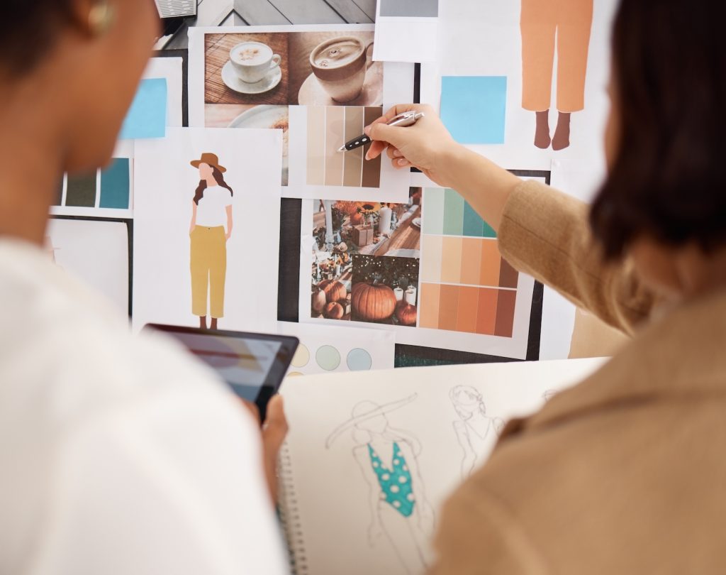 Fashion designer, planning and creative people for sketch, color palette and branding choice on moodboard. Artist clothes, production teamwork and employees with illustration or drawing for ecommerce